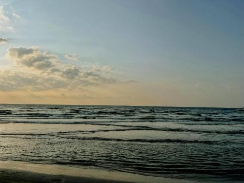 a view of the ocean from the beach at Newly Build House!Island Charm Balcony Vibes 3 Min to Beach in Galveston