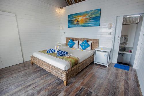 Postel nebo postele na pokoji v ubytování Grand Sea View Lembongan