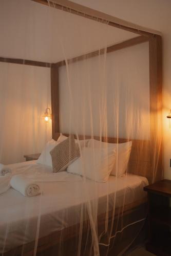 Katil atau katil-katil dalam bilik di Koku House Arugam Bay