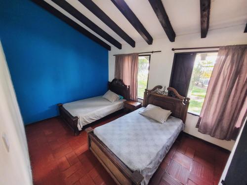 Postel nebo postele na pokoji v ubytování Finca Doña Ana