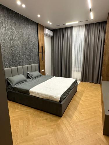 Katil atau katil-katil dalam bilik di Premium Apartments - BI Group Dendropark