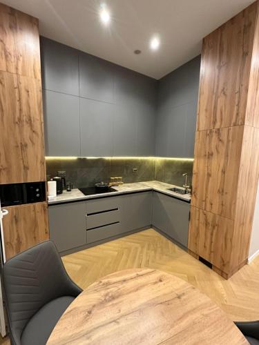 Dapur atau dapur kecil di Premium Apartments - BI Group Dendropark