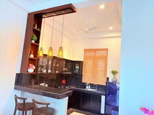 Køkken eller tekøkken på Green Paradise Villa - Unawatuna