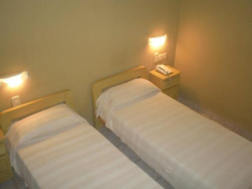 Katil atau katil-katil dalam bilik di Hotel Barrancas San Pedro