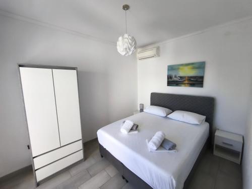Postel nebo postele na pokoji v ubytování Apartments Marija