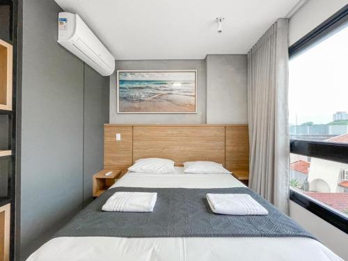 Ένα ή περισσότερα κρεβάτια σε δωμάτιο στο Luxury Collection Jacuzzi e Sala de Cinema