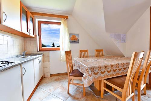 Kuchyň nebo kuchyňský kout v ubytování Apartment Anna