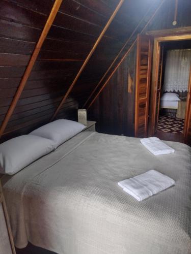 Ένα ή περισσότερα κρεβάτια σε δωμάτιο στο Casa do sol
