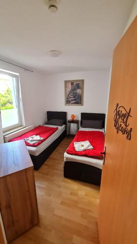 Katil atau katil-katil dalam bilik di Ferienwohnung Heike