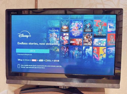 a television with a screen displaying a bunch of video games at Yuki's house - Kyoto single-family house, 3 minutes to the nearest bus stop in Kyoto