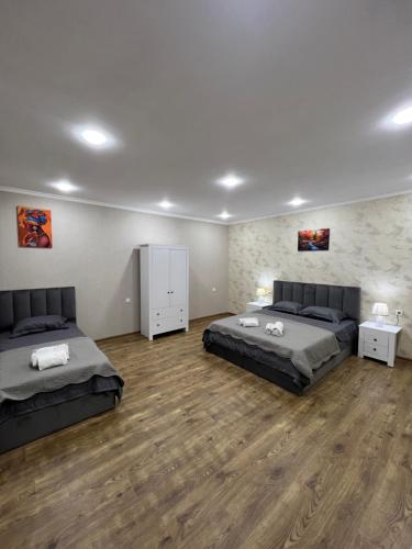 Postel nebo postele na pokoji v ubytování Home in Tiflis