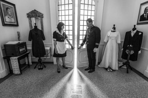 a man and woman standing in a room with clothes on display at Villa La Meridiana - Caroli Hotels in Leuca