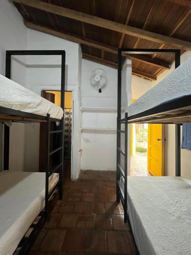 Ein Bett oder Betten in einem Zimmer der Unterkunft Hostel Trip Monkey Barichara