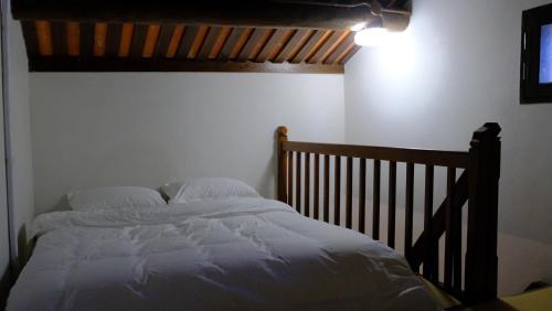 Ένα ή περισσότερα κρεβάτια σε δωμάτιο στο Wuhe Hotel