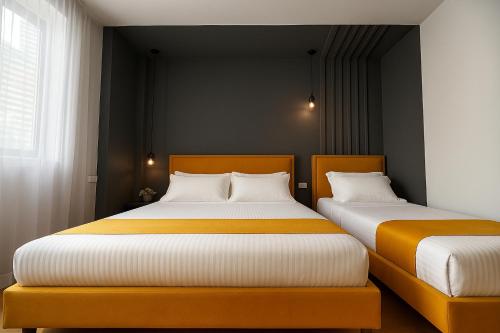 Una cama o camas en una habitación de NEW - Colorful by the sea