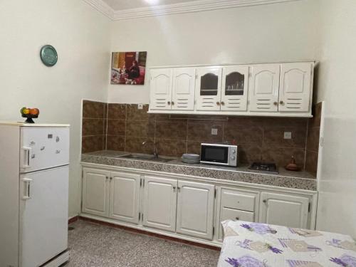 Kuchyň nebo kuchyňský kout v ubytování Hotel Maison Olga