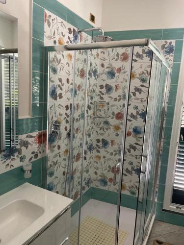 a shower in a bathroom with a sink at marella in Minori