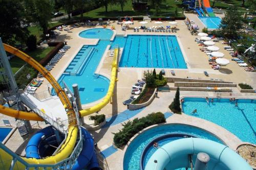 a large swimming pool with a water park at Mobile House LaSiesta Thermal park Terme 3000 in Moravske Toplice