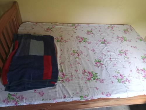 Postel nebo postele na pokoji v ubytování Globegivers homestay