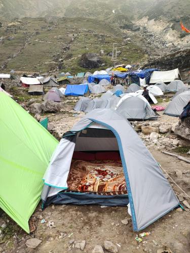 a group of tents on top of a mountain at Kedarnath Camps by Annu in Kedārnāth