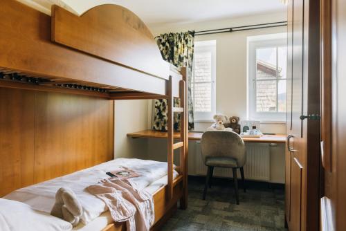 Postel nebo postele na pokoji v ubytování Sammer's Rosenchalet