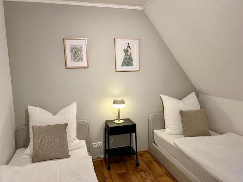 Ένα ή περισσότερα κρεβάτια σε δωμάτιο στο Michels Apartment Gütersloh