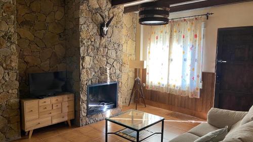 Et tv og/eller underholdning på Apartamento Rural Sierra de Segura