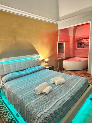 Postel nebo postele na pokoji v ubytování B&B ME Palace