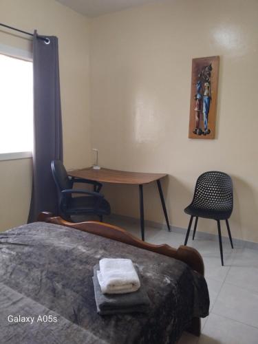 Appart Acapulco 2chbres 2sdbにあるベッド