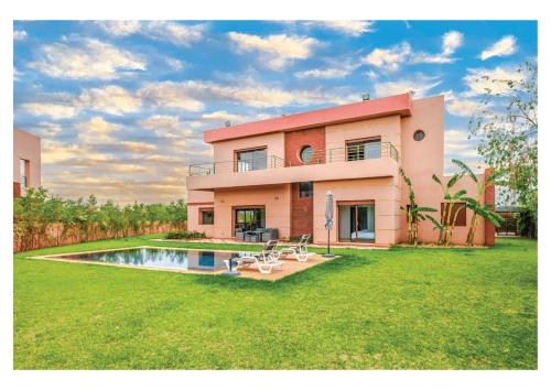 a house with a swimming pool in the yard at Villa Dahlia Jacuzzi, Stove, Pool in Marrakesh