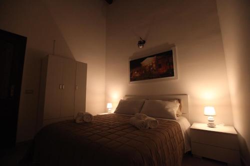 Centro storico apartment & Loft - Amnesia Holiday Homeにあるベッド