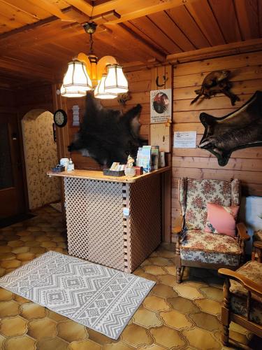 a room with a counter and a chair in a room at Privatzimmer Pendl in Abtenau