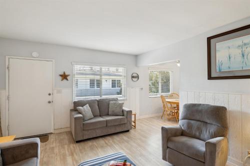 a living room with a couch and a chair at 4980 Sandyland Road #215 in Carpinteria