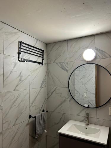 a bathroom with a sink and a mirror at Los Penitentes in Los Penitentes