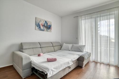 Postel nebo postele na pokoji v ubytování Seabreeze Rafailovici