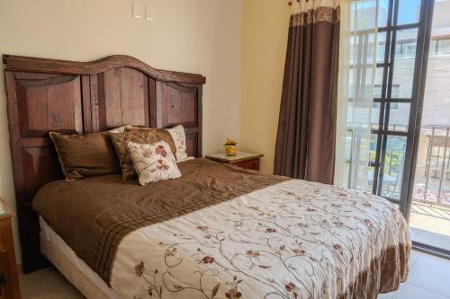 Postel nebo postele na pokoji v ubytování Casa Lía - En el corazón de Playa del Carmen