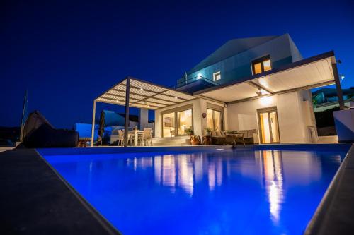 Πισίνα στο ή κοντά στο Nostos Villa