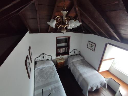 Postel nebo postele na pokoji v ubytování Casa Gelisa