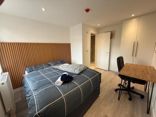 Postel nebo postele na pokoji v ubytování Moorfields Villas
