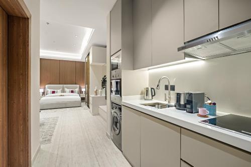 Postel nebo postele na pokoji v ubytování YamamaLiv - KAFD