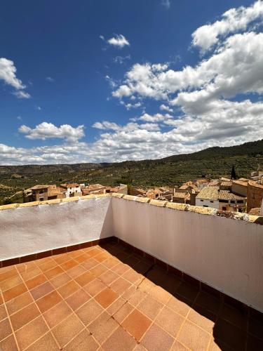 a balcony with a view of a city at Rincón de Letur in Letur