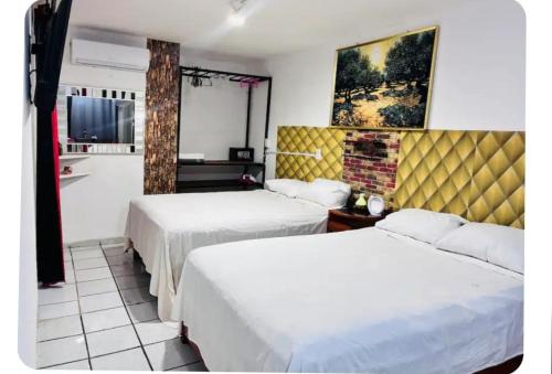 A bed or beds in a room at Otho mich
