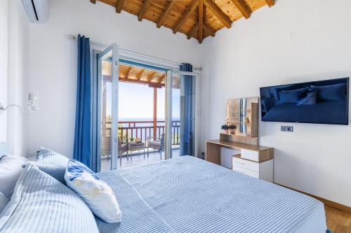 Postel nebo postele na pokoji v ubytování Villa Mavraki