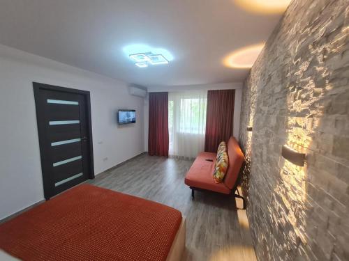 Ένα ή περισσότερα κρεβάτια σε δωμάτιο στο Apartament modern Metrou Titan - Miniș