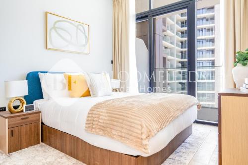 Postel nebo postele na pokoji v ubytování Bloomfields Elegant 1Br in Al Maryah Island