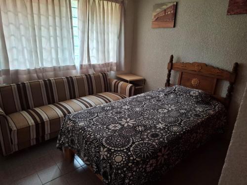 Postel nebo postele na pokoji v ubytování Confortables habitaciones en zona residencial de Vista Bella, Morelia Michoacan