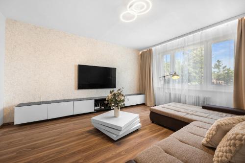 Apartment 10 minutes from city centre with garden