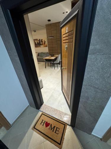 a door with a sign that says i love me at Ambla holidays in Golem