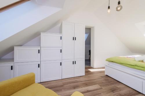 Cama o camas de una habitación en Apartmán Viki - Rezidence K Lanovce