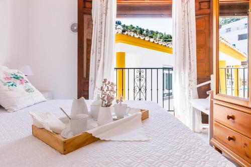 Ένα ή περισσότερα κρεβάτια σε δωμάτιο στο Casa Elodí, 3 beautiful apartments and 1 private studio in Sayalonga